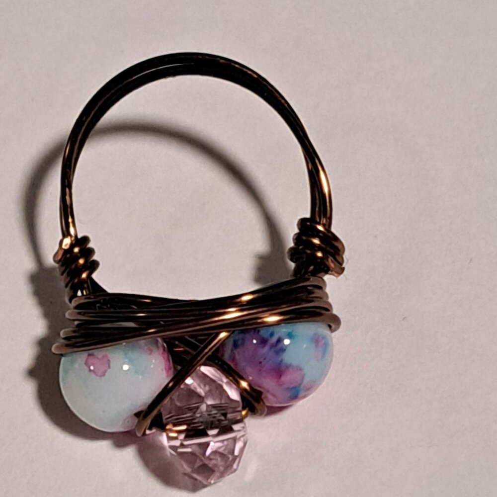 copper brown color wire ring with 3 beads